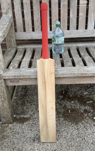 Cricket bat with red grip - grip,